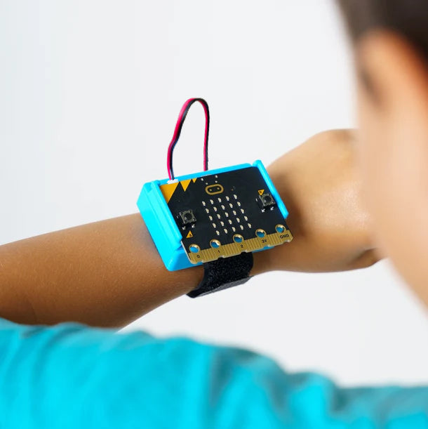 Student wearing CHARGE for micro:bit  on his wrist