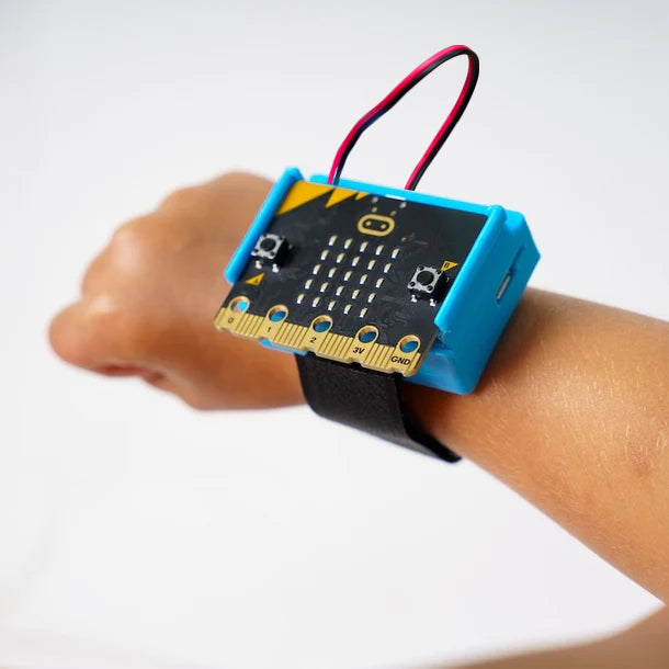 Student wearing CHARGE for micro:bit on their wrist